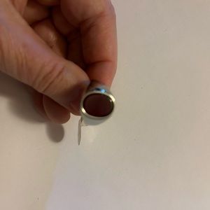 Stainless steel ring with dark red stone. Size 9